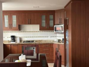 Instant Hotel - Departamentos de lujo en Ambato