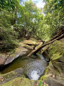 Air conditioned home with full kitchen, TV and parking