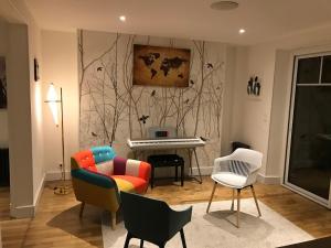 Maisons de vacances Beautiful 8-bedroom family home : photos des chambres