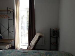 Appartements JARDIN FLEURI - STAYHOME - Appart 1 : photos des chambres