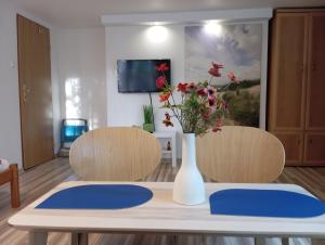 Chatki Saturnina i pokoje