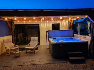 Maisons de vacances Evasion haut de gamme : photos des chambres