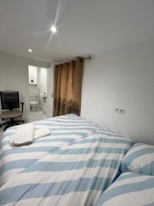 Maisons d'hotes Chambre dans un appartement : Grande Chambre Double 