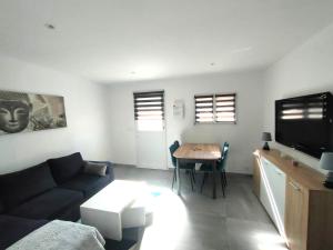 Appartements 2 pieces en RDC climatise avec terrasse et parking prive : photos des chambres