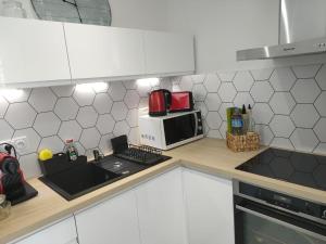 Appartements 2 pieces en RDC climatise avec terrasse et parking prive : photos des chambres