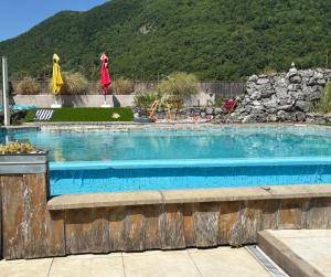 Appartements AU PIED DES CIMES meuble de tourisme 3 etoiles classement 2023 : photos des chambres