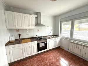 Piso con terraza y garaje a un Paso de la Playa de Tapia