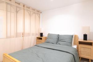Appartements Nids cosy - Terrasse privee - proche Paris et stade de France : photos des chambres