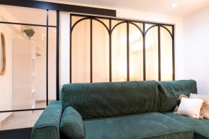Appartements Nids cosy - Terrasse privee - proche Paris et stade de France : photos des chambres