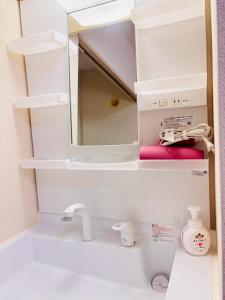 Nakajima501 1stop to Susukino, next to Nakajima Park, in a quiet residential neighborhood, accommodates 2 people