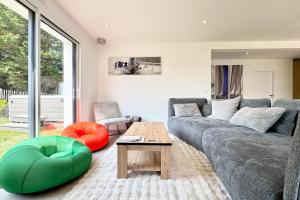 Maisons de vacances Jacuzzi prive & plage a pied Maison neuve : photos des chambres