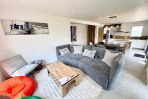 Maisons de vacances Jacuzzi prive & plage a pied Maison neuve : photos des chambres