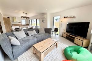 Maisons de vacances Jacuzzi prive & plage a pied Maison neuve : photos des chambres
