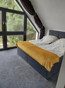 Domki z widokiem na jezioro Kotkowo