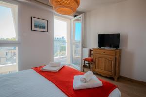 Appartements PanoramiK Hippodrome - 2 ch - Parking - By Primo concIergerie : photos des chambres