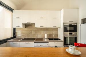 Appartements Le Neptune : photos des chambres