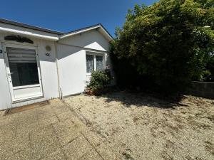 Maisons de vacances Captain's Quarters - Maison en bord de plage : Maison 3 Chambres