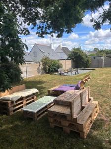 Maisons de vacances La Flora - Charmante maison avec jardin : photos des chambres