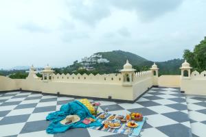 SaffronStays Rang Havelii - Superior room in heritage haveli near City Palace with rooftop chhatri & pool in Udaipur