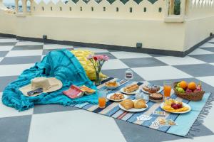 SaffronStays Rang Havelii - Superior room in heritage haveli near City Palace with rooftop chhatri & pool in Udaipur