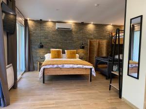 Appartements Gite du petit ourson - Vue jardin - : photos des chambres