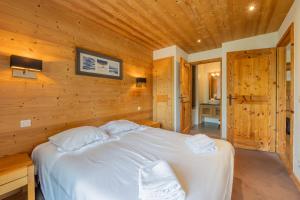 Appartements l-Ours Bleu A35 - Ski in Ski out - Happy Rentals : photos des chambres