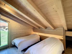 Appartements Duplex neuf avec terrasse face au Mont Blanc, 3 chambres et mezzanine, a 3 km du centre de Combloux - FR-1-560-65 : photos des chambres