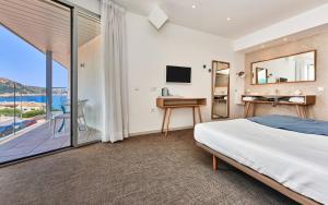 Double or Twin Room with Partial Sea View room in Mar Azul Pur Estil Hotel & Spa - Adults Only