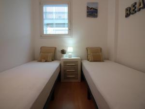 Apartamento luminoso con terraza y piscina comunitaria en Santa Margarita, cerca de la playa. - ES-228-138