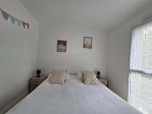 Appartements Appartement neuf 62 m², 5 couchages, a 250 m de la plage - balcon, jardin prive, et parking inclus - FR-1-364-111 : photos des chambres