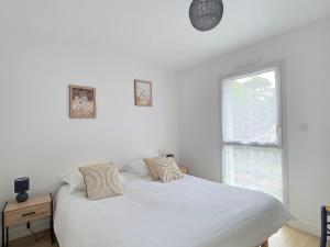 Appartements Appartement neuf 62 m², 5 couchages, a 250 m de la plage - balcon, jardin prive, et parking inclus - FR-1-364-111 : photos des chambres