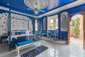 SaffronStays Rang Havelii - Luxurious Premium Rajasthani art-themed stay with City Palace views