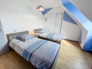 Maisons de vacances Maison a 500m de la plage avec jardin, 4 chambres, Wi-Fi et parking - 8 couchages - FR-1-361-539 : photos des chambres