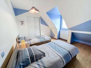 Maisons de vacances Maison a 500m de la plage avec jardin, 4 chambres, Wi-Fi et parking - 8 couchages - FR-1-361-539 : photos des chambres