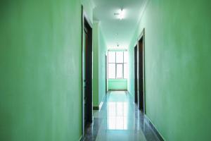 Hotel O Infopark Kochi Malabar Plaza Residency