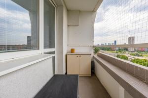 City Glow Apartment with Balcony