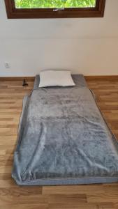 Rum i centrum med madrass