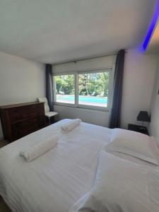 Appartements Piscine & Parking Prive - 2 min du Lac d-Annecy : photos des chambres