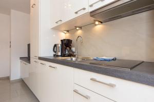 Apartment Koralj 2 with a heated Pool