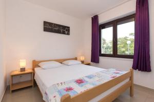 Apartment Koralj 2 with a heated Pool