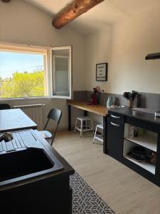 Appartements Studio cosy equipe, deux couchages , pres des collines de Martigues : photos des chambres