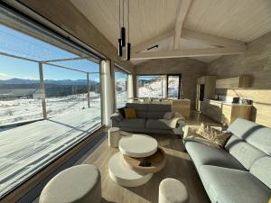 Chalets Artik chalet avec vue a 180 degres et piscine : photos des chambres