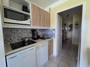 Appartement T2 avec terrasse, résidence front de mer