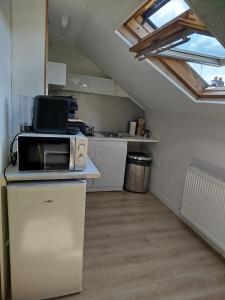 Appartements Le studio SQ4 : photos des chambres