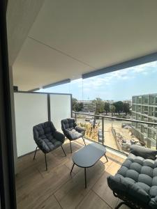 Studio en bord de mer avec piscine sur le toit