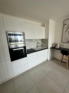 Studio en bord de mer avec piscine sur le toit