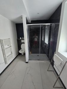 Appartements Appartement avec jardin et BBQ : photos des chambres