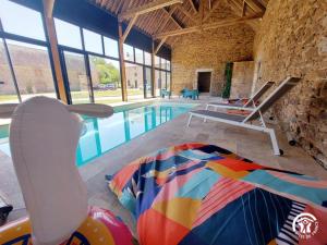 Maisons de vacances Le Logis des Vallees, 6/7 pers avec piscine et sauna : photos des chambres