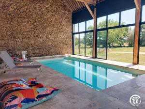 Maisons de vacances Le Logis des Vallees, 6/7 pers avec piscine et sauna : photos des chambres