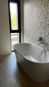 Apartamentai Monciškėse su šildomu baseinu ir terasa